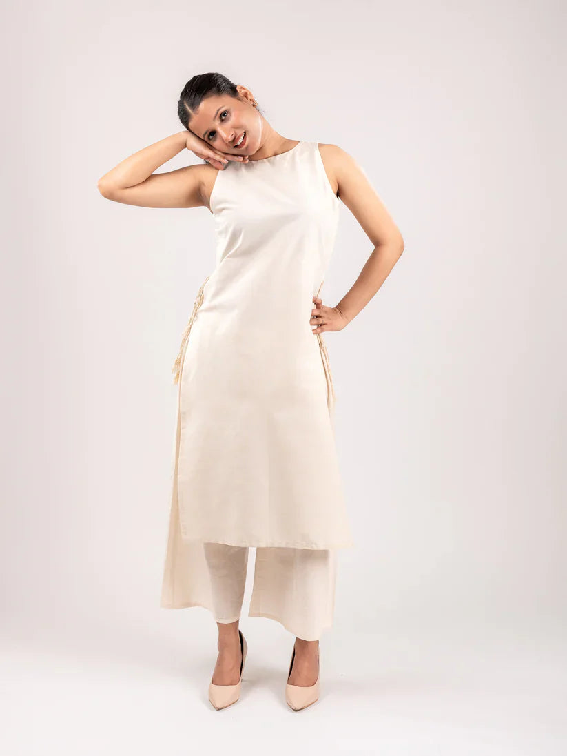Blush  Ivory Sleeveless Asymmetric Kurta Set with Tassel Tie-Up