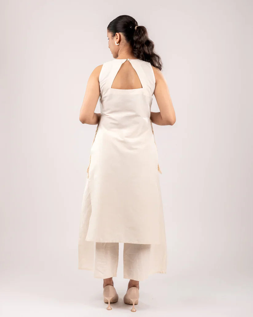 Blush  Ivory Sleeveless Asymmetric Kurta Set with Tassel Tie-Up