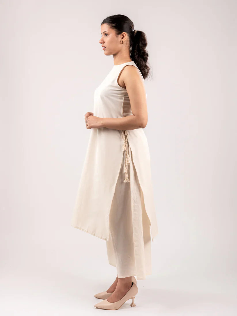 Blush  Ivory Sleeveless Asymmetric Kurta Set with Tassel Tie-Up