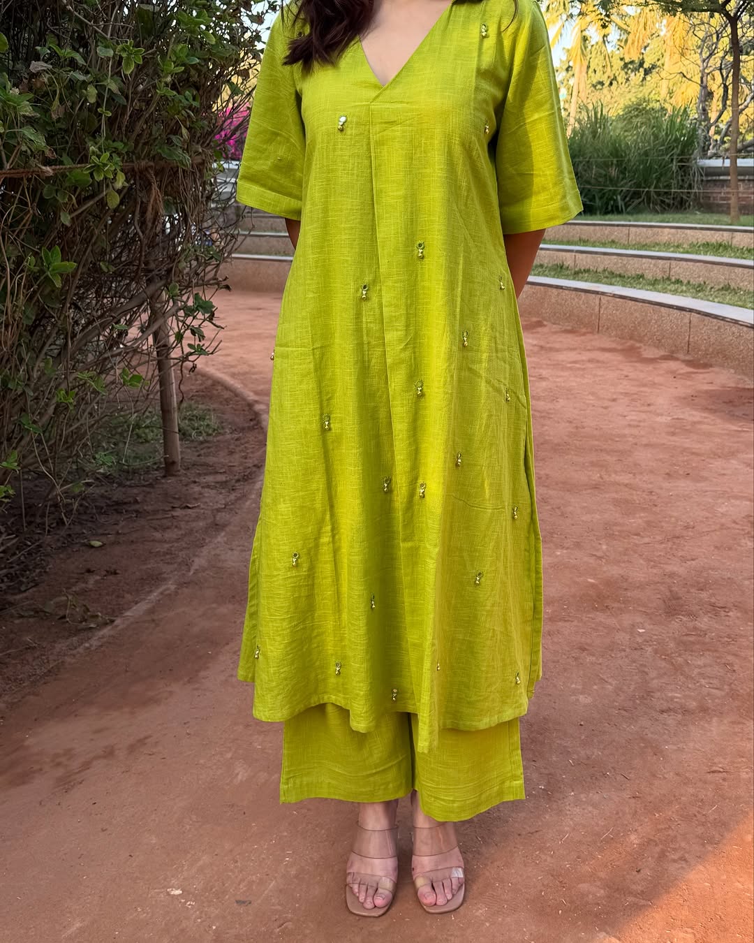 Comfortable Flared Parrot Green Kurta Palazzo Set