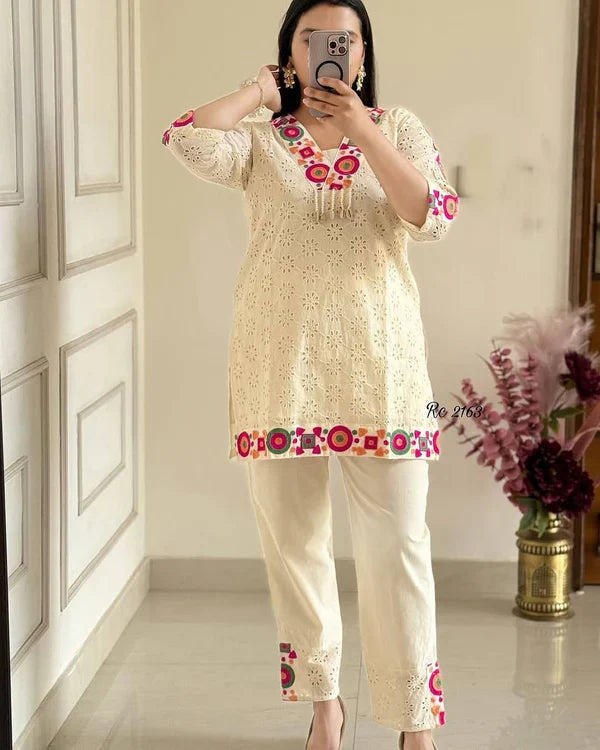 Off-White Cotton Eyelet Kurta Set with Colorful Mirror-Style Embroidery
